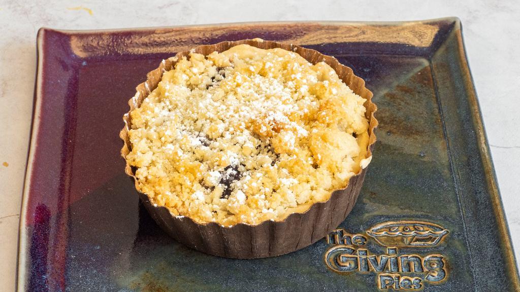 Blueberry Pie · Vegetarian. Sweet blueberry filling with our signature almond crumble topping. A berry lover's favorite! Freezer friendly. Contains: wheat, butter, almonds.