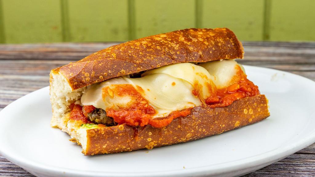 Italian Meatball Sandwich · Meatballs, tomato sauce, Parmesan and mozzarella cheese, served on a soft roll.