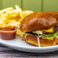 Cheeseburger · Served with mayo, mustard, ketchup, lettuce, tomato, and pickle. onion, ketchup