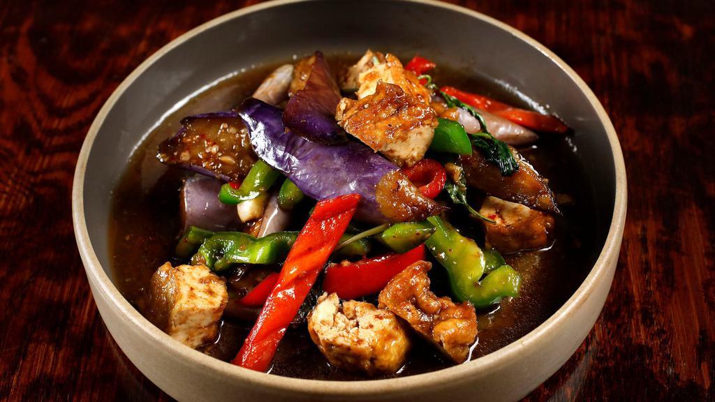 Spicy Eggplant · Spicy. Stir-fried tofu, eggplants, fresh chilies, bell pepper and basil.