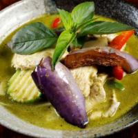 Green Curry · Spicy. Green curry paste with coconut milk, bamboo shoots, bell pepper, eggplant, zucchini a...