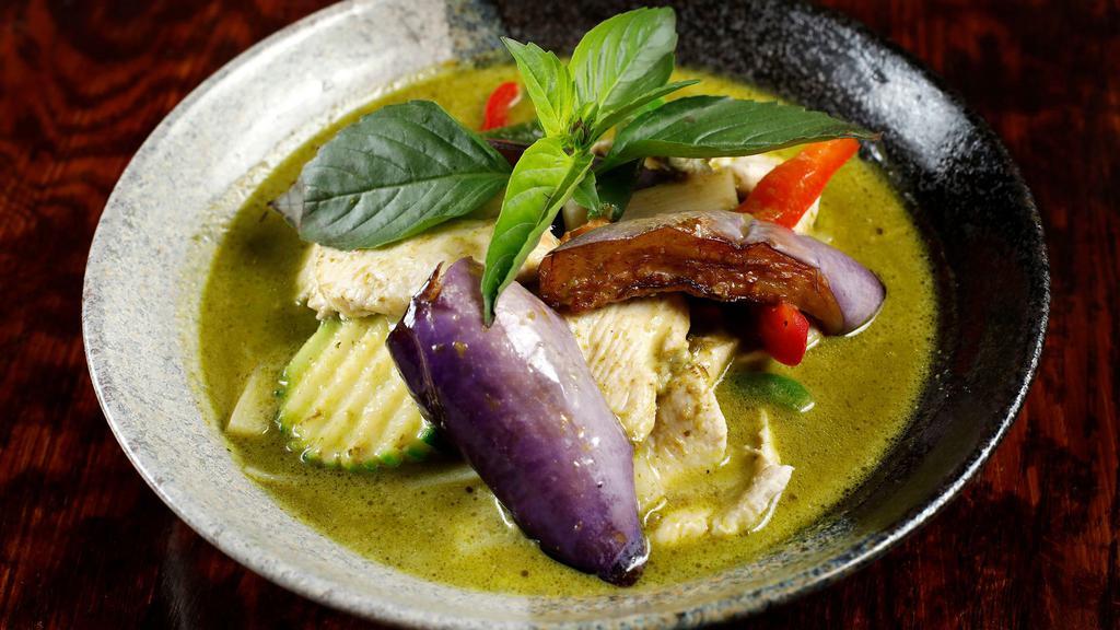 Green Curry · Spicy. Green curry paste with coconut milk, bamboo shoots, bell pepper, eggplant, zucchini and basil with your choice of protein.