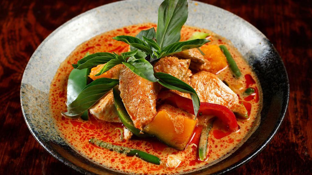Pumpkin Curry · Spicy. Kabocha squash, bell pepper, basil, and string bean in red curry sauce with your choice of protein.