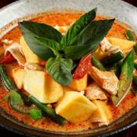 Mango Curry · Spicy. Golden mango, bell pepper, sting bean, and basil in red curry sauce with your choice ...