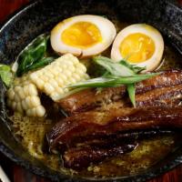 Moo Ramen · Ramen noodles with slow cooked braised sweet pork belly, caramel egg, spinach, green onion, ...