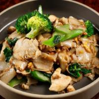 Pad See Eiw · Pan fried flat rice noodle with egg, broccoli and black bean sauce with your choice of prote...