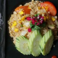 Thai Fried Rice · Fried rice with egg, tomato, onion, and green onion with your choice of protein.