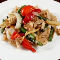 Thai Spicy Pan Fried · Spicy. Pan fried flat rice noodle with tomato, onion, green bean bell pepper, basil and fres...