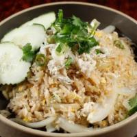 Crab Fried Rice · Fried rice with double eggs, onion and green onion top with crab meat. Served with fresh cuc...