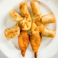 Assorted Appetizers · Minimum of two orders. Includes egg roll, cream cheese rangoon, fried prawn, and potsticker.