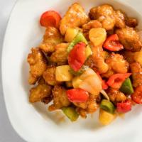 Sweet & Sour Chicken · Crispy chicken nuggets with sweet and sour sauce.