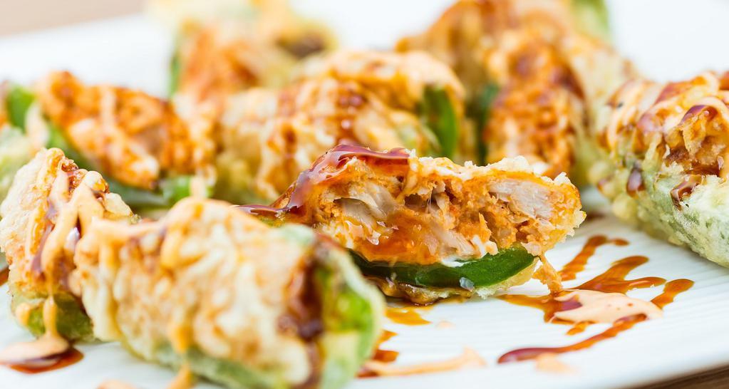 Blow the Whistle · Deep fried jalapeño stuffed with cream cheese and spicy tuna, topped with chef's special sauce.