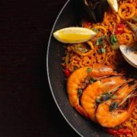 Arroz Mar x2 people · Spanish Bomba rice, saffron with
green beans, whole shrimp, mussels, clams and calamari