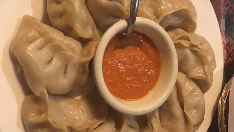Vegetable Jhol Momo · Eight pieces. Vegetable momo served with spicy homemade momo soup.