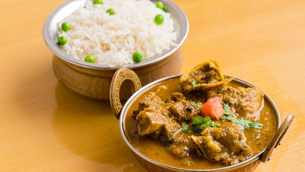 Goat Curry · Favorite. Gluten free. Bone-in goat meat cooked in authentic Nepalese style in house special sauce, herbs and spices. Served with rice.