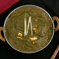 Palak Paneer · Gluten free. Minced spinach with fried cheese cubes cooked in a creamy sauce special herb an...