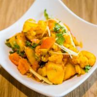 Aloo Cauli · Vegan, gluten free. Potatoes and cauliflower sautéed with garlic, ginger paste and cooked in...