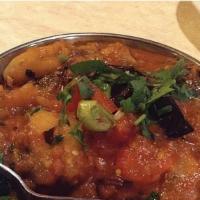 Aloo Bhanta · Vegan, gluten free. Eggplant mixed with potatoes and homemade onion sauce and spices.