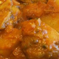 Chicken Curry · Gluten free. Boneless chicken thigh cooked in onion tomato sauce with special herbs and spic...
