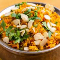 Goat Biryani · Premium goat meat with bone cooked with basmati rice in a special biryani meat masala and to...