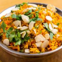 Vegetable Biryani · Vegan, gluten free. Seasonal mixed vegetable cooked with basmati rice in a special biryani m...