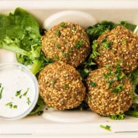 Falafel · (Vegetarian, Vegan, Gluten-free) Garbanzo beans mixed with selected spices and deep-fried
 t...