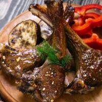 Halal Asian BBQ Lamb Chops · Customer's favorite lam chops seasoned in with spicy chili and yellow bean sauce. Served wit...