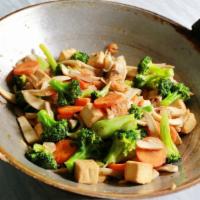 Assorted Vegetable Stir Fry · Fresh broccoli, green peas, mushrooms, carrots, asparagus, and mixed bell peppers. Served wi...