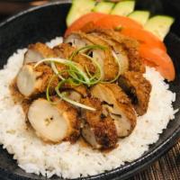 White Lotus Bowl · Vegan. King oyster mushroom (nature’s chicken) deep fried in seasoned batter and covered in ...
