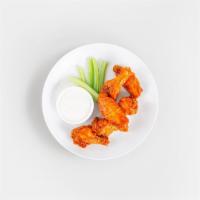 Chicken Wings · Twelve freaking good chicken wings in buffalo sauce with a side of ranch.