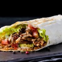 Asada (Steak) Breakfast Burrito · A mouthwatering Breakfast burrito made with Flour tortilla and filled with scrambled eggs, A...