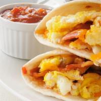 Bacon Breakfast Burrito · Crispy bacon burrito served with fresh eggs, cheese, and home fries.