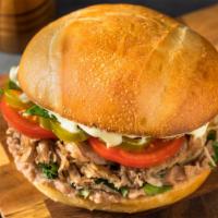 Torta de Puk Choc (Pork Chop) · A delicious sandwich made with Mexican bread and filled with Grilled Pork chops, beans, cabb...