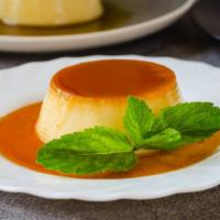Flan · Delicious homemade custard dessert topped with a layer of caramel.