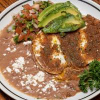 Huevos Rancheros · Housemade tortilla, beans, eggs, avocado, pico de gallo.