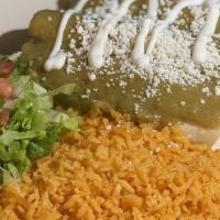 Enchiladas verdes · Three housemade tortillas, chicken, sour cream, house sauce, rice.