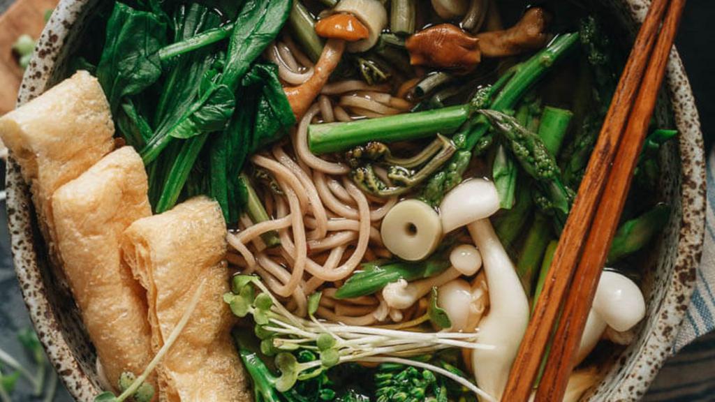 Vegetable Soba Soup · Japanese-style soup, prepared with Soba (buckwheat noodles), fresh vegetables, house seasoning, green onions, seaweed, sesame seed, and mixed vegetables.