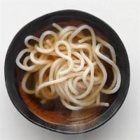 Plain Udon Soup · Japanese-style soup, prepared with Udon (thick flour noodles), green onions, seaweed, sesame...