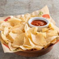Chips & Salsa · Extra-thin authentic corn tostada chips made fresh daily. Served with fresh salsa.