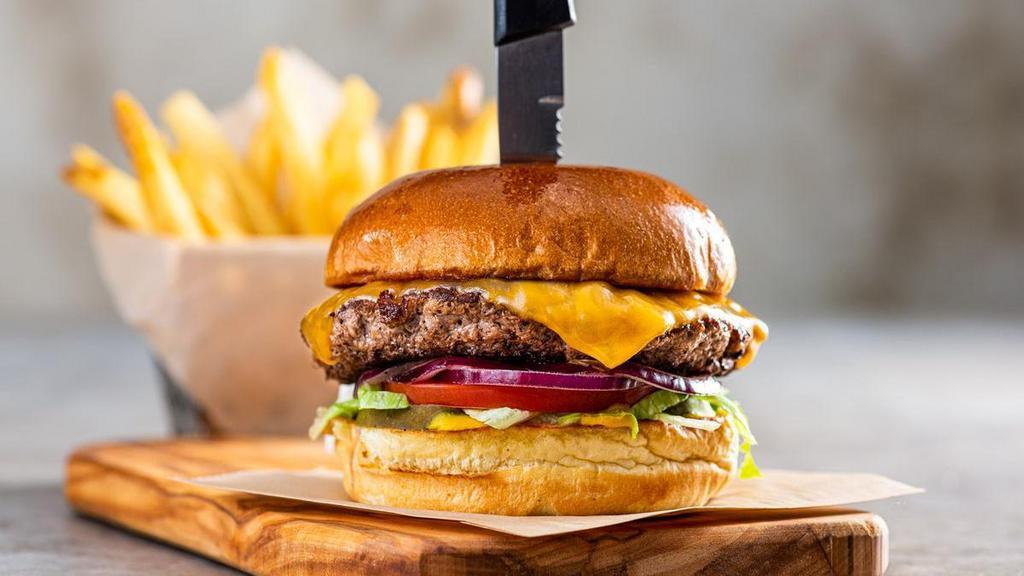 Oldtimer® W/Cheese* · You can’t top burger perfection, unless you add cheese.