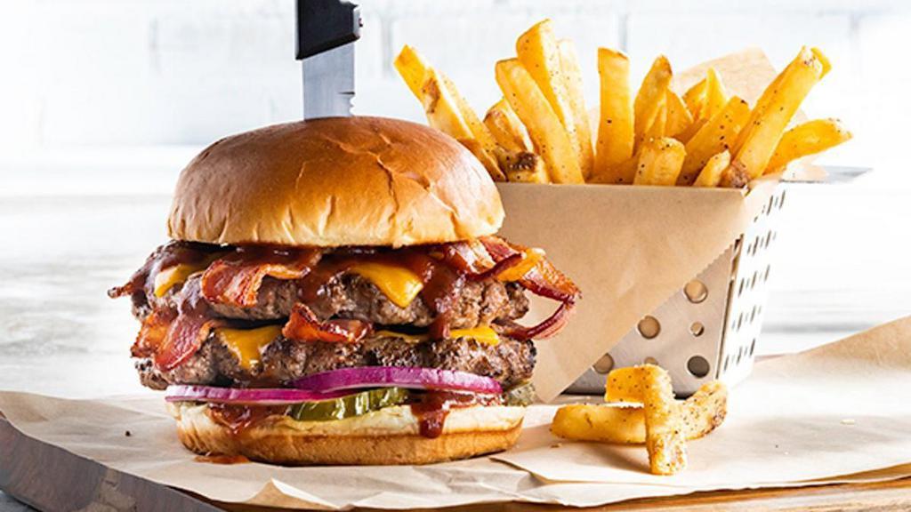 Big Bacon Bbq Burger* · Two beef patties, six slices of bacon, house BBQ, cheddar, red onion, pickles.