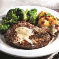 Classic Ribeye* · Marbled, thick-cut steak topped with garlic butter. Served with loaded mashed potatoes, stea...