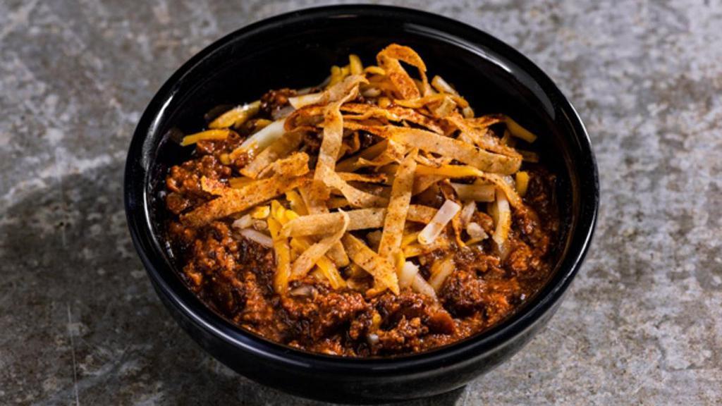 Bowl Of The Original Chili · Yeah, chili is our thing. Our original recipe, filled with beef, onions & signature blend of spices. Topped with shredded cheese & tortilla strips.