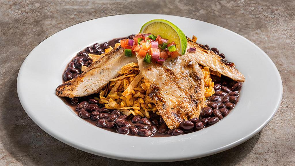 Margarita Grilled Chicken · Pico, tortilla strips, Mexican rice, black beans. It only tastes like a guilty pleasure.