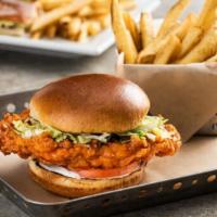 Buffalo Chicken Ranch Sandwich · Hand-breaded crispy chicken with spicy Buffalo sauce, tomato, lettuce, house-made ranch on a...