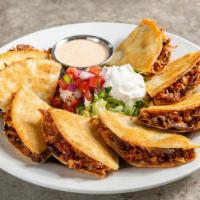 Beef Bacon Ranch Quesadillas · Steak, shredded cheese, chile spices, bacon, house-made ranch. Served with pico, sour cream,...