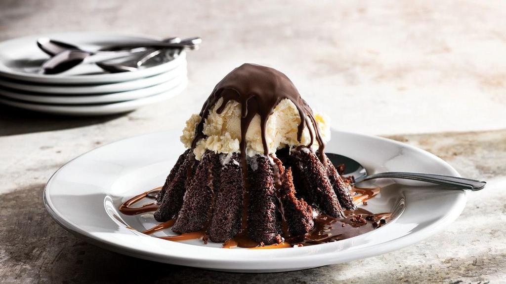 Molten Chocolate Cake · Chocolate cake with a molten chocolate center, topped with vanilla ice cream in a chocolate shell. Big enough to share, too good to actually do it.