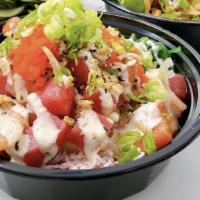 1. Ahi Tuna & Salmon · Includes ahi-tuna and salmon. Seaweed salad, imitation crab, cucumber, corn, white onions, j...