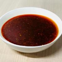 Sweet Chili Sauce · A sweet and sour sauce made with chilis, raw sugar, soy sauce, sesame oil, vinegar, garlic a...