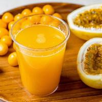 Passion Fruit Beverage · Sweet and tangy, passion fruit beverage served in a 16-ounce bottle.